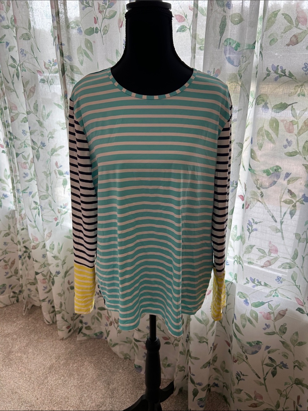 Striped Long-Sleeve swim shirt.